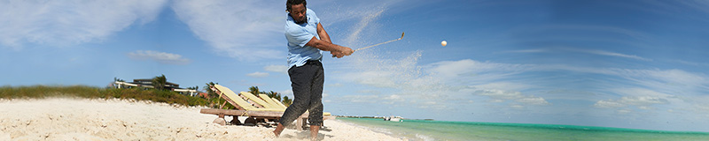 Dhani Jones golfing on the beach